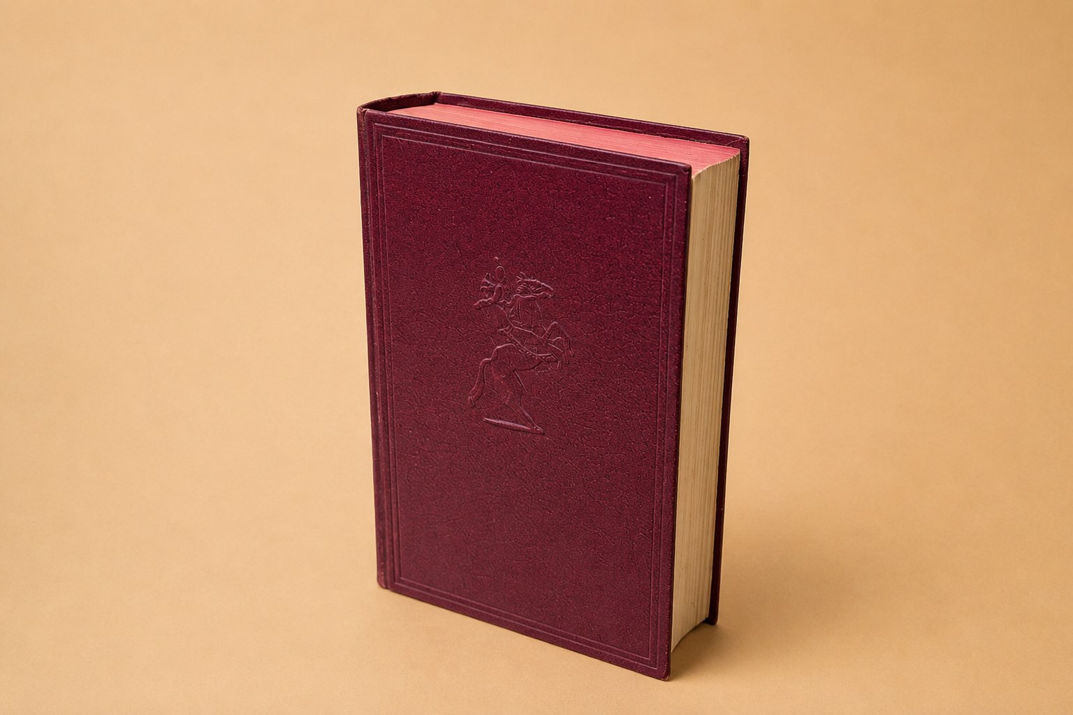 Maroon flexible-bound omnibus book, 'Fifty Thrilling Wild West Stories', with gilt lettering on the spine and a gilt-embossed device on the front cover, published by Odhams Press.