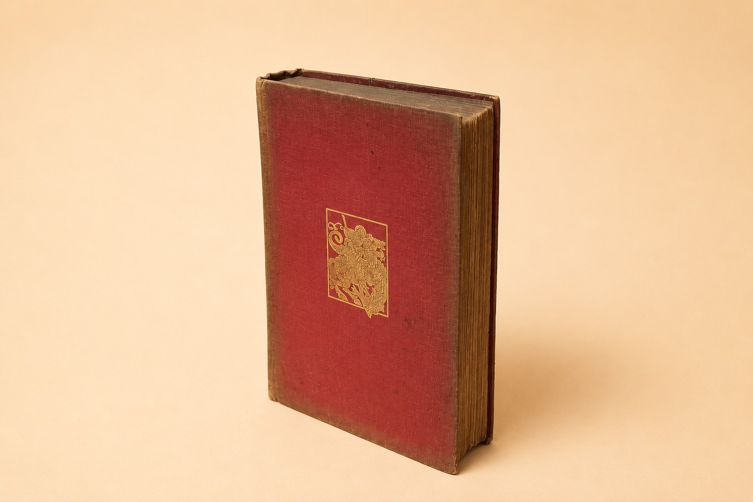 A 1917 first edition of G. K. Chesterton's 'A Short History of England', red cloth boards with a gilt heraldic device and a spine faded to pale tan; shown with its Chatto & Windus title page dated MCMXVII and a front flyleaf bearing the pencilled name 'Francesca Claremont'.