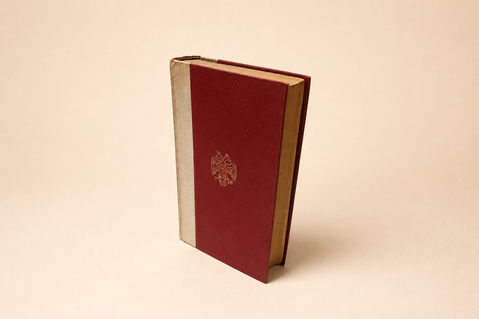 War and Peace by Leo Tolstoy, Macmillan OUP 1943 reprint, two-tone red and cream hardback with Russian Imperial double-headed eagle emblem